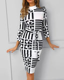 Robe mi-longue à col roulé rayée